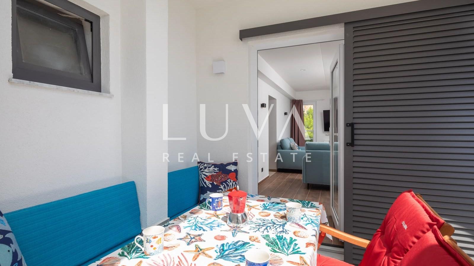 Omiš, Stanići, seafront house with pool for sale