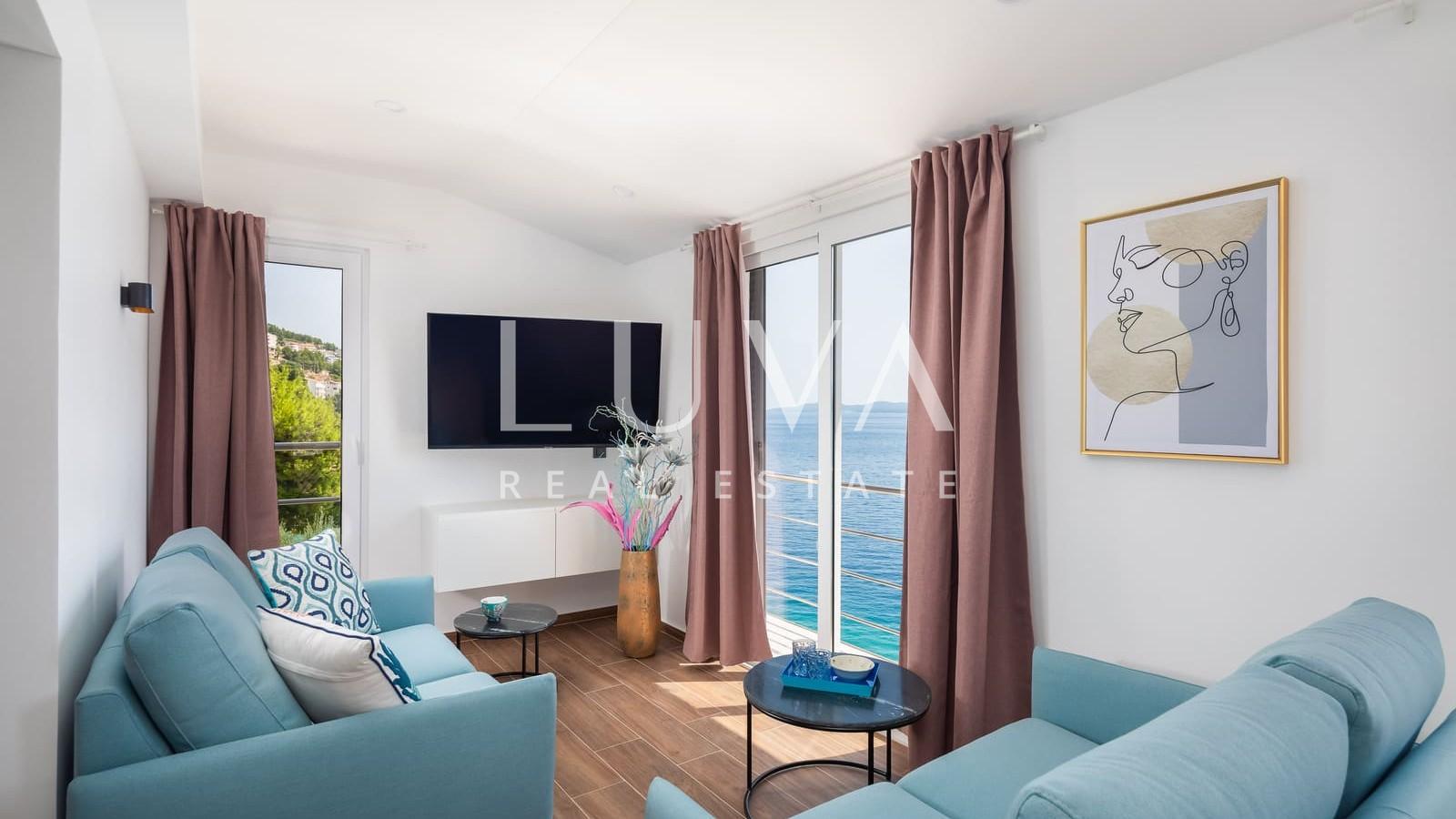 Omiš, Stanići, seafront house with pool for sale