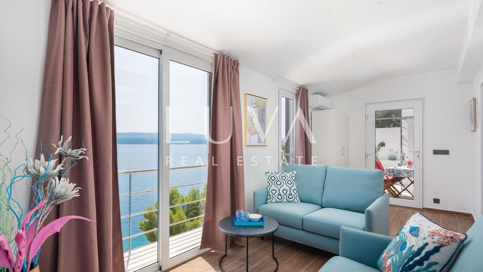 Omiš, Stanići, seafront house with pool for sale