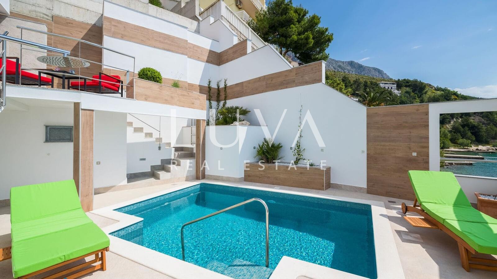 Omiš, Stanići, seafront house with pool for sale