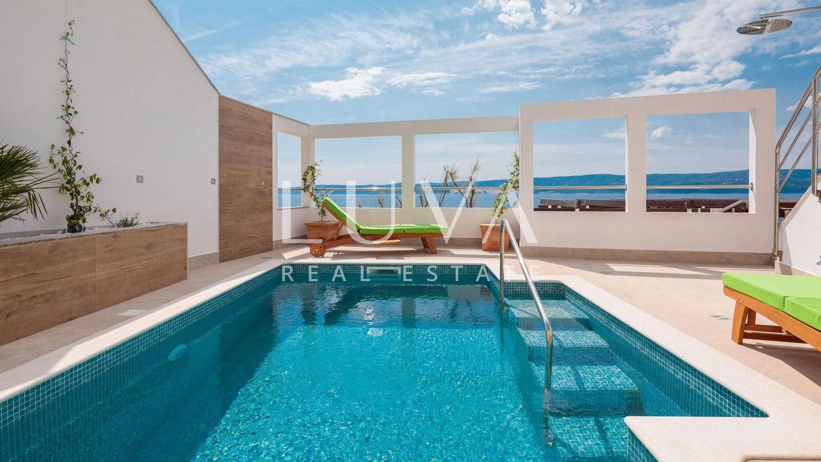 Omiš, Stanići, seafront house with pool for sale