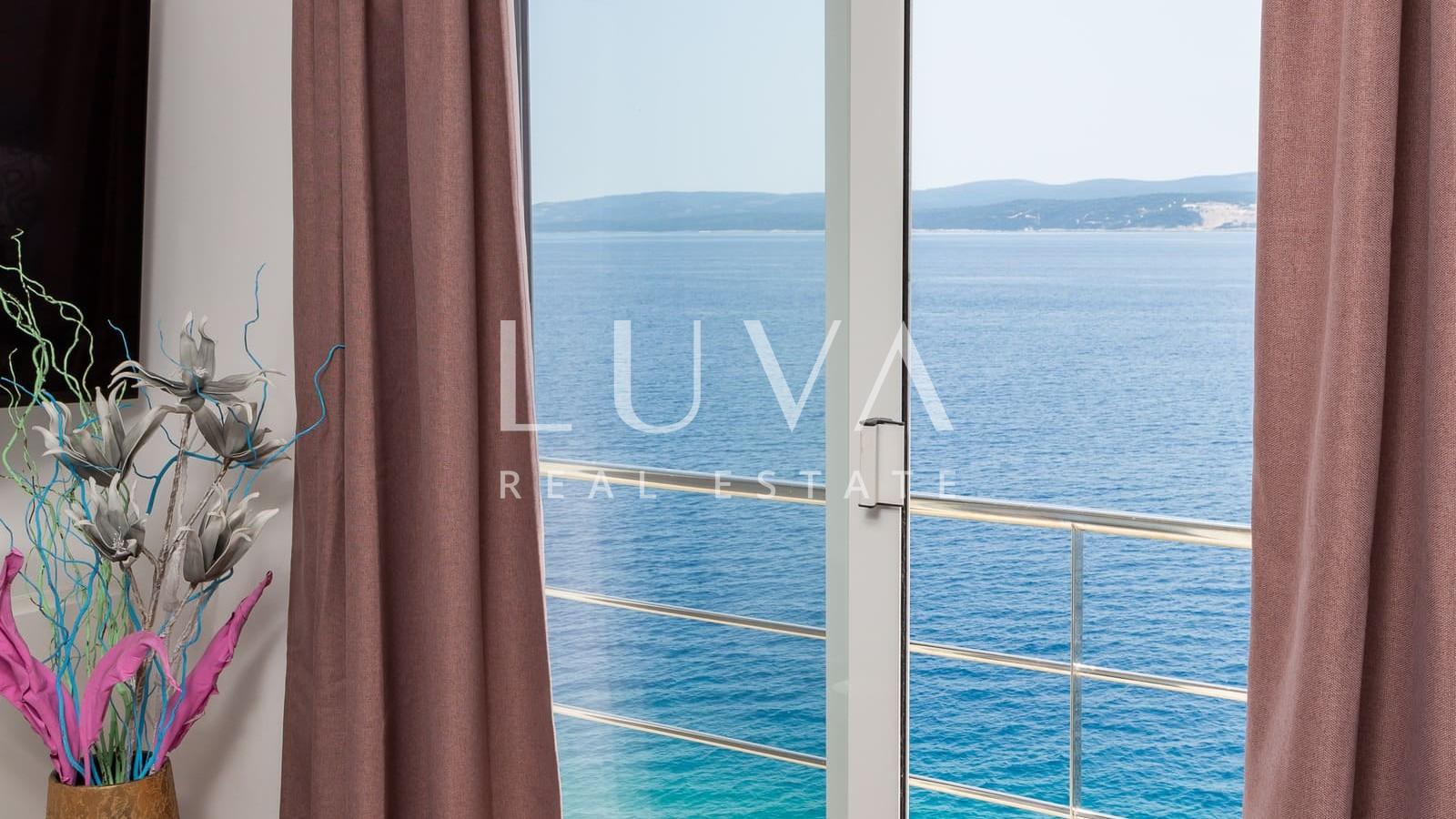 Omiš, Stanići, seafront house with pool for sale