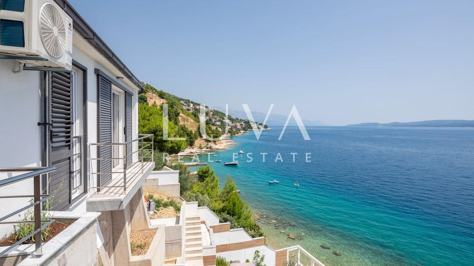 Omiš, Stanići, seafront house with pool for sale