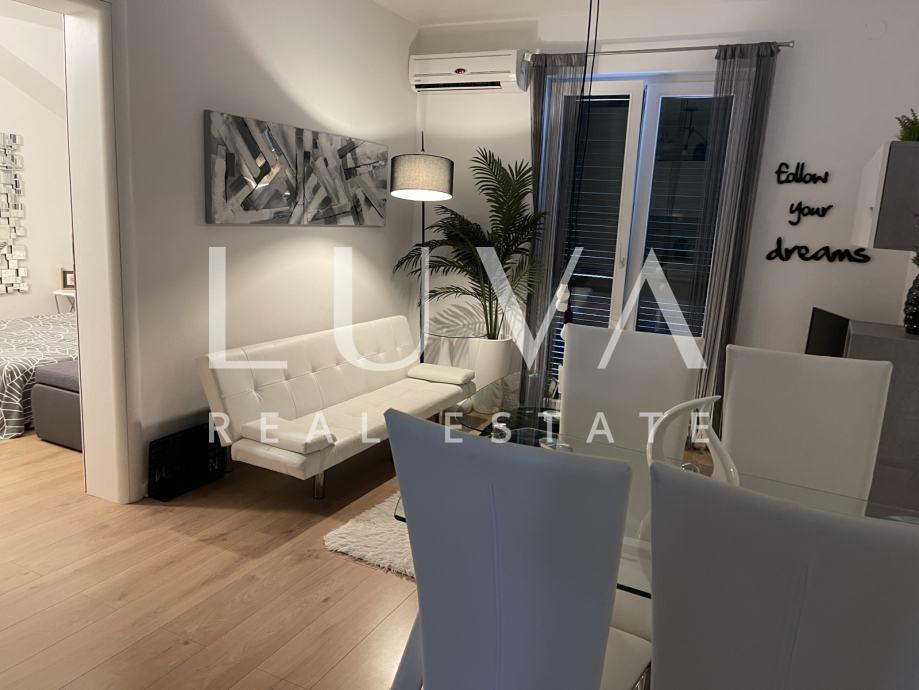 Brač, Supetar, modernly furnished apartment with sea view for sale