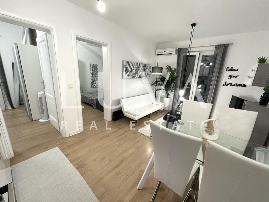 Brač, Supetar, modernly furnished apartment with sea view for sale