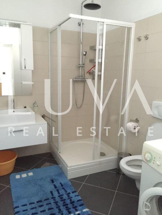 Brač, Supetar, three-storey building, established tourist property with sea view