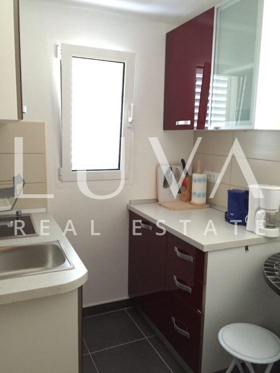 Brač, Supetar, three-storey building, established tourist property with sea view