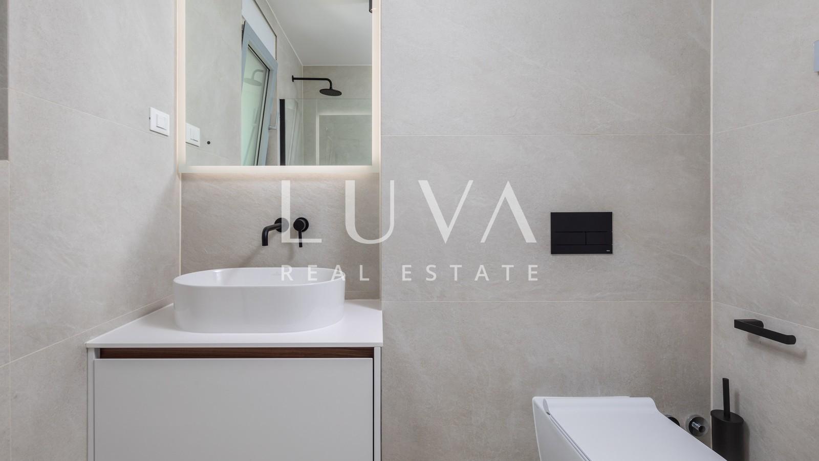 Opatija, luxury new building with garden, apartment NFA 125.81 m²