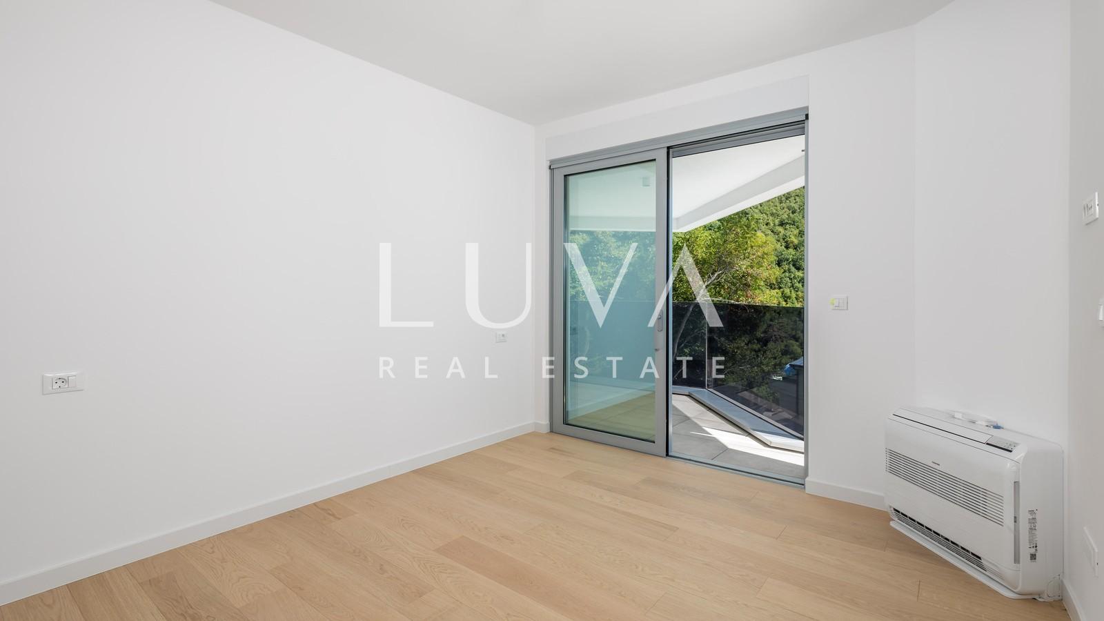 Opatija, luxury new building with garden, apartment NFA 125.81 m²