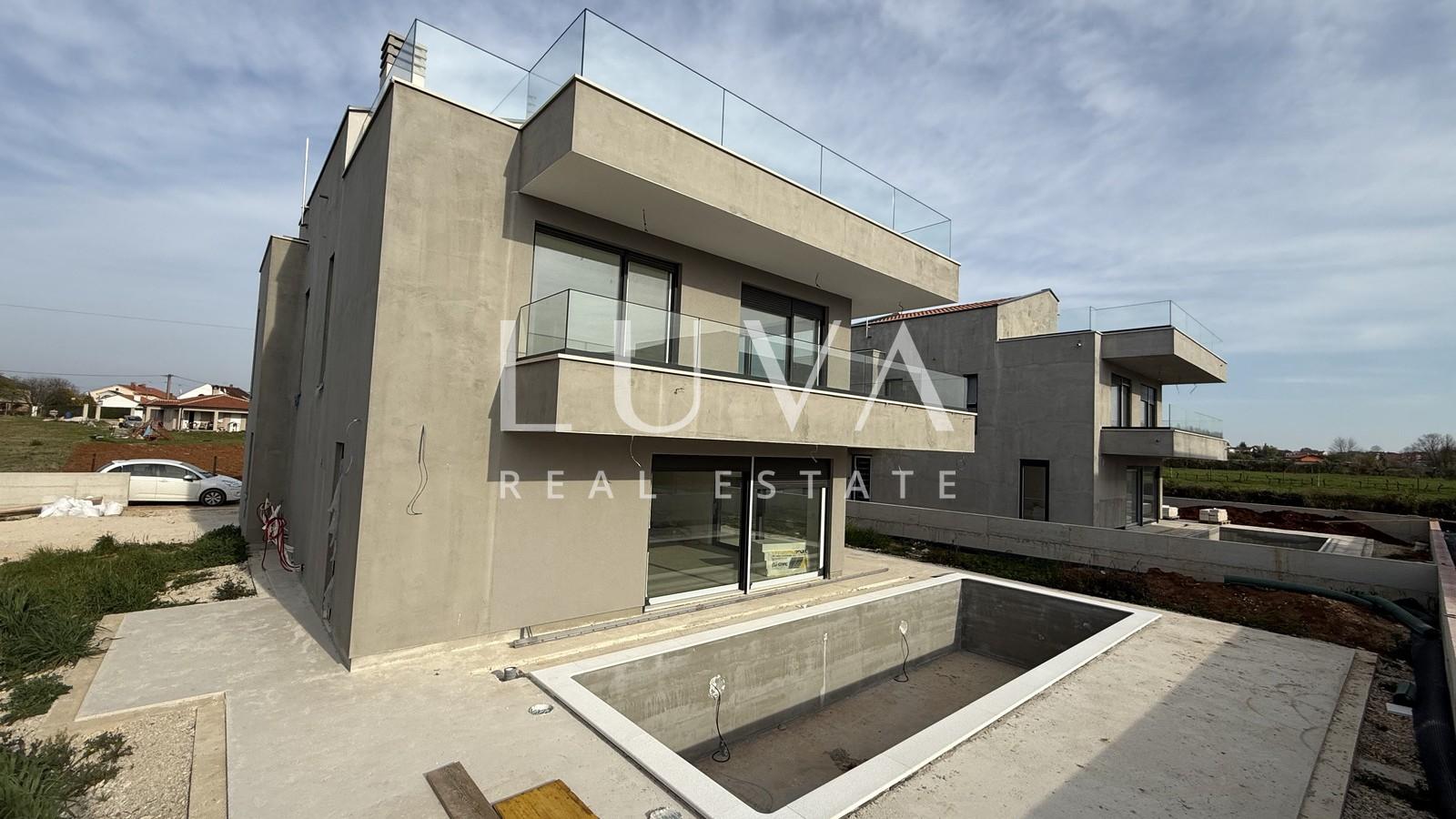 Poreč, modernes Einfamilienhaus mit Pool und Meerblick, 233 m²