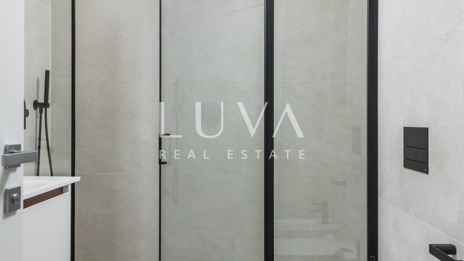 Opatija, luxury new building with garden, apartment NFA 125.81 m²