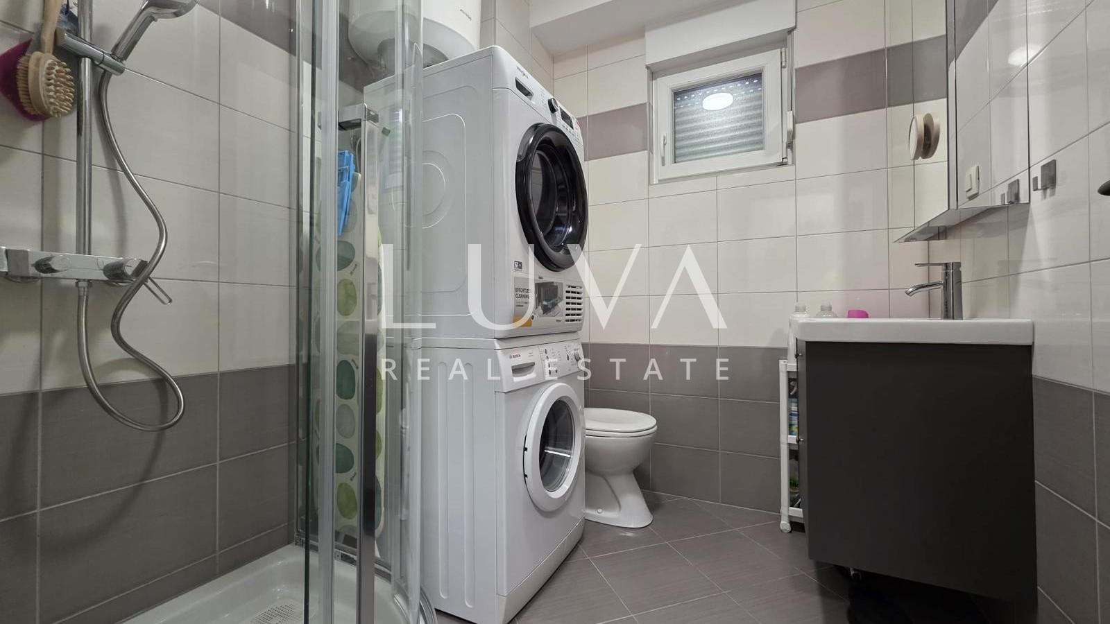 Split, Kman, sale of a beautifully furnished apartment with parking