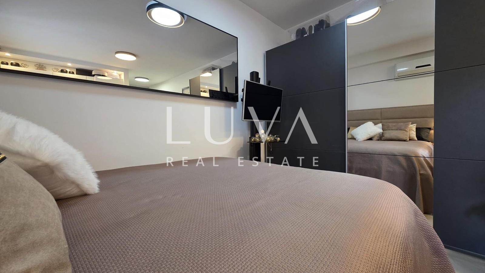 Split, Kman, sale of a beautifully furnished apartment with parking