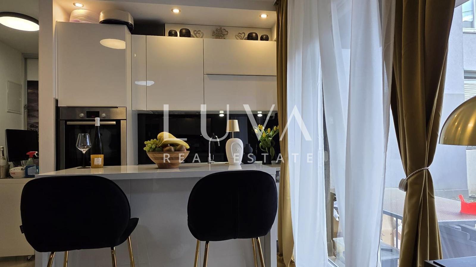 Split, Kman, sale of a beautifully furnished apartment with parking