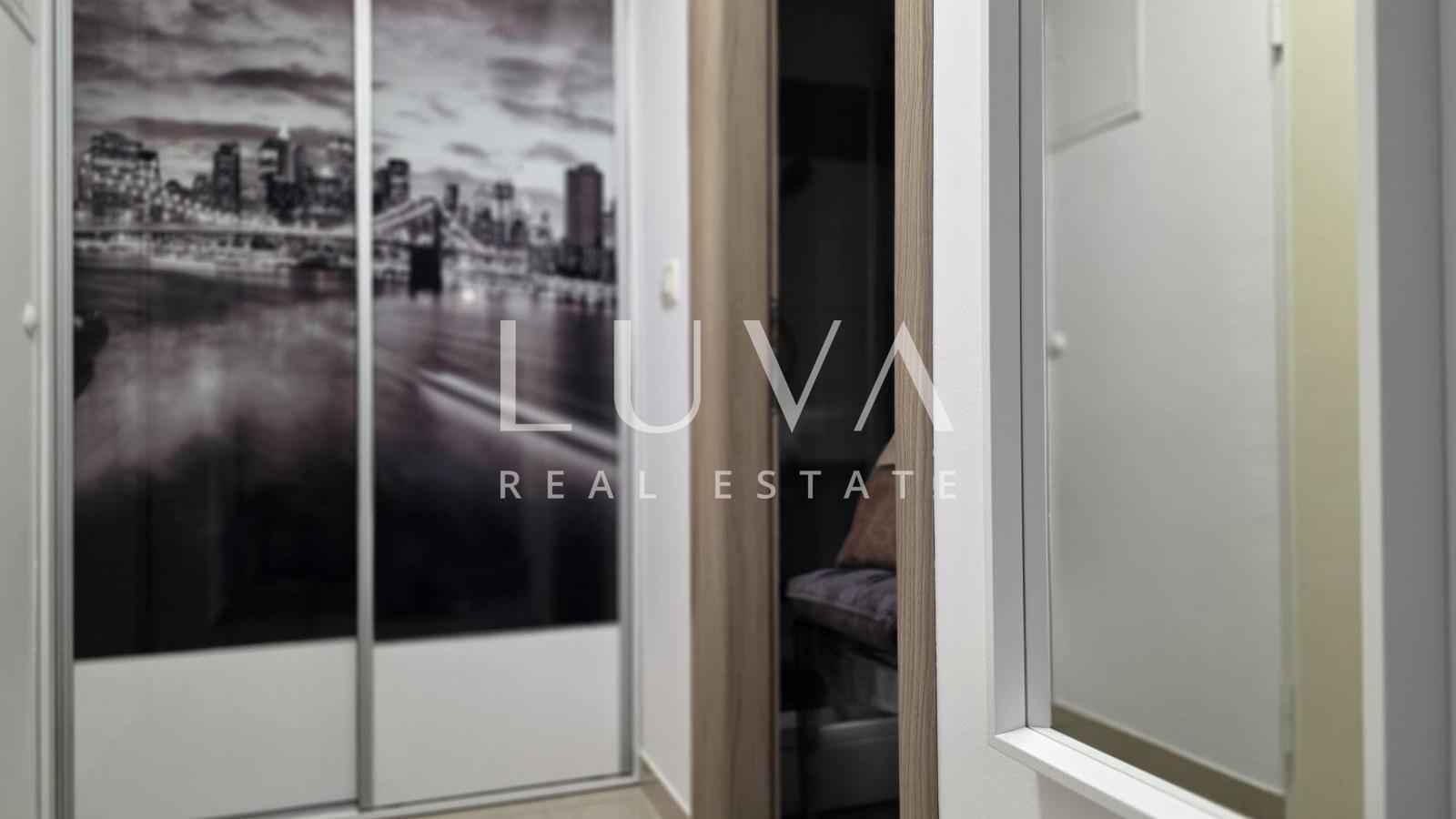 Split, Kman, sale of a beautifully furnished apartment with parking