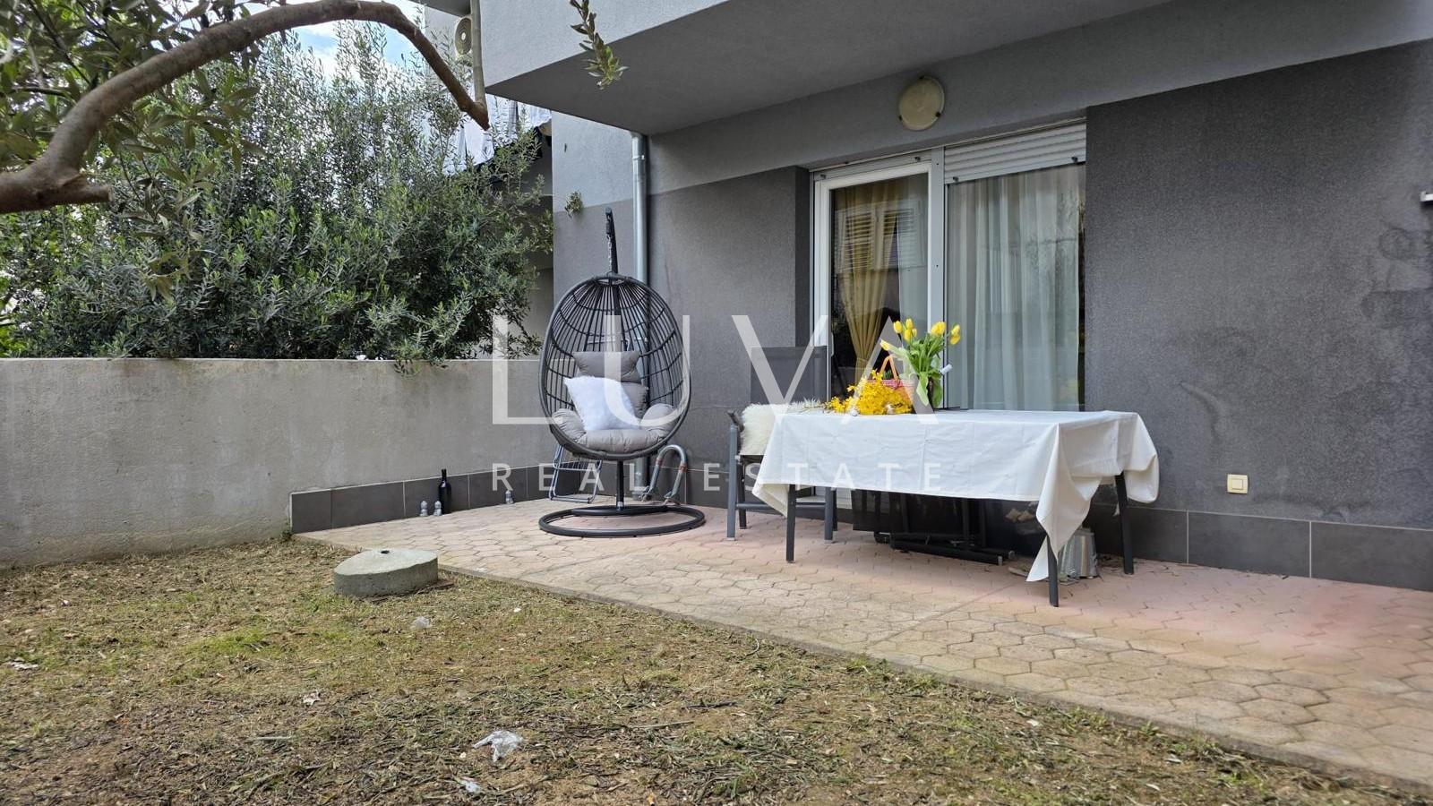 Split, Kman, sale of a beautifully furnished apartment with parking