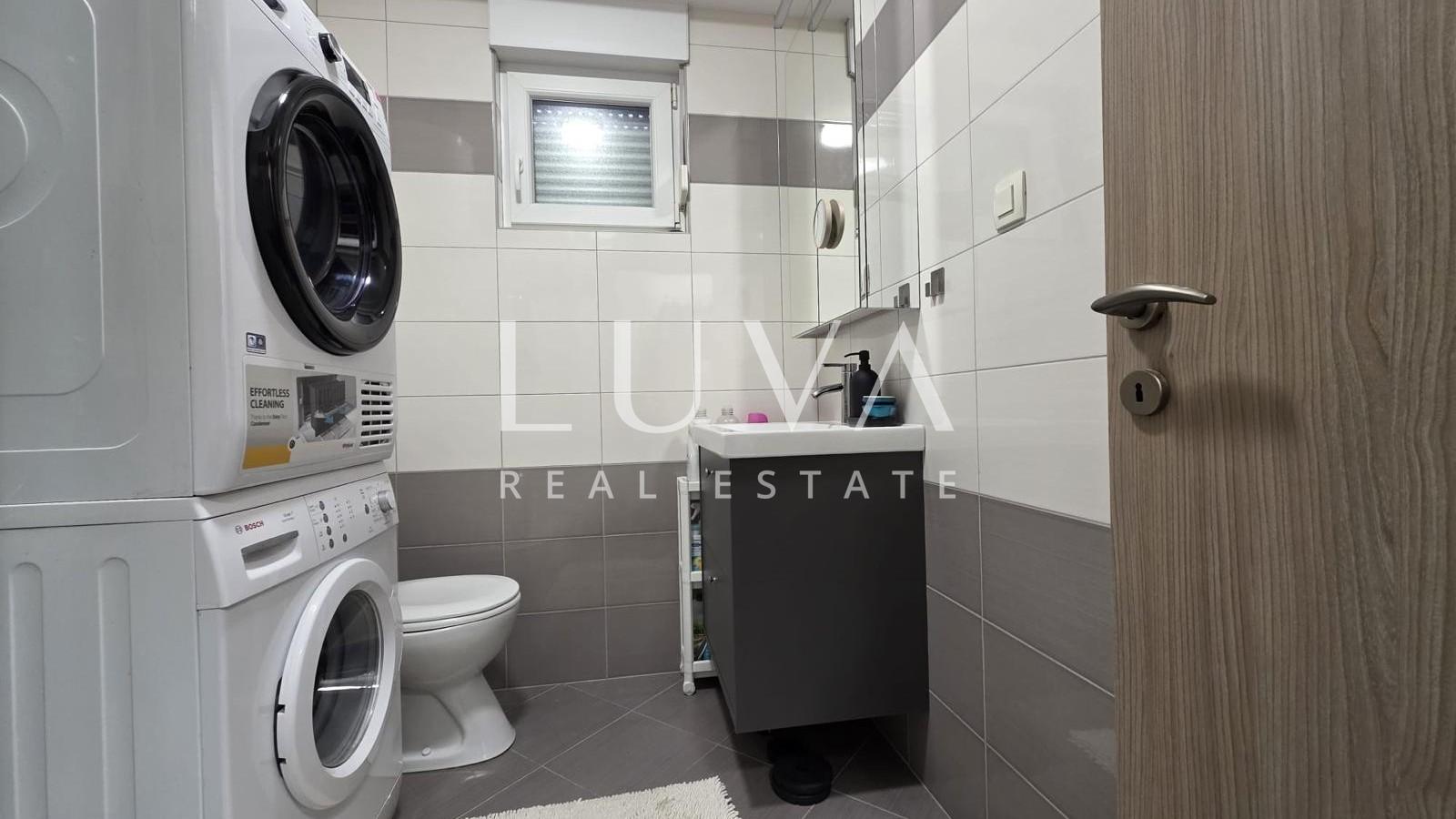 Split, Kman, sale of a beautifully furnished apartment with parking