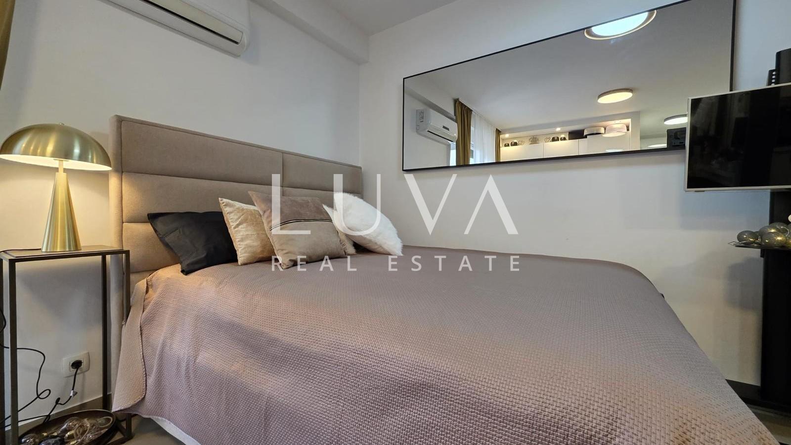 Split, Kman, sale of a beautifully furnished apartment with parking