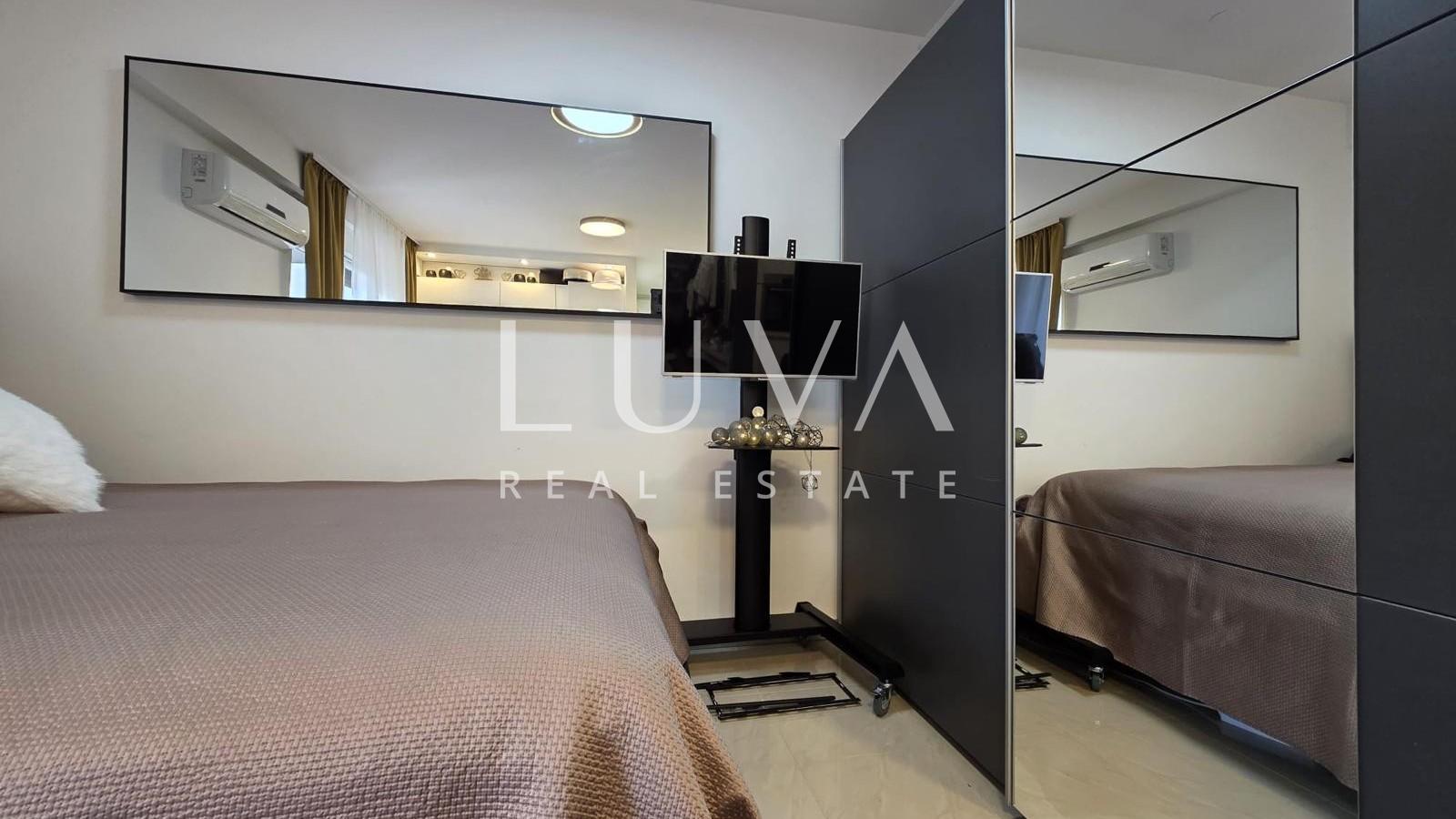 Split, Kman, sale of a beautifully furnished apartment with parking