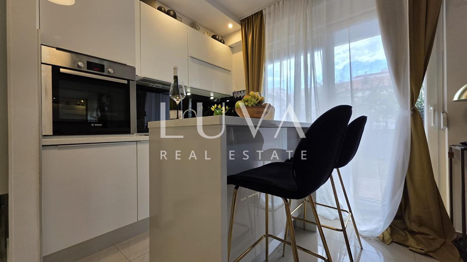 Split, Kman, sale of a beautifully furnished apartment with parking