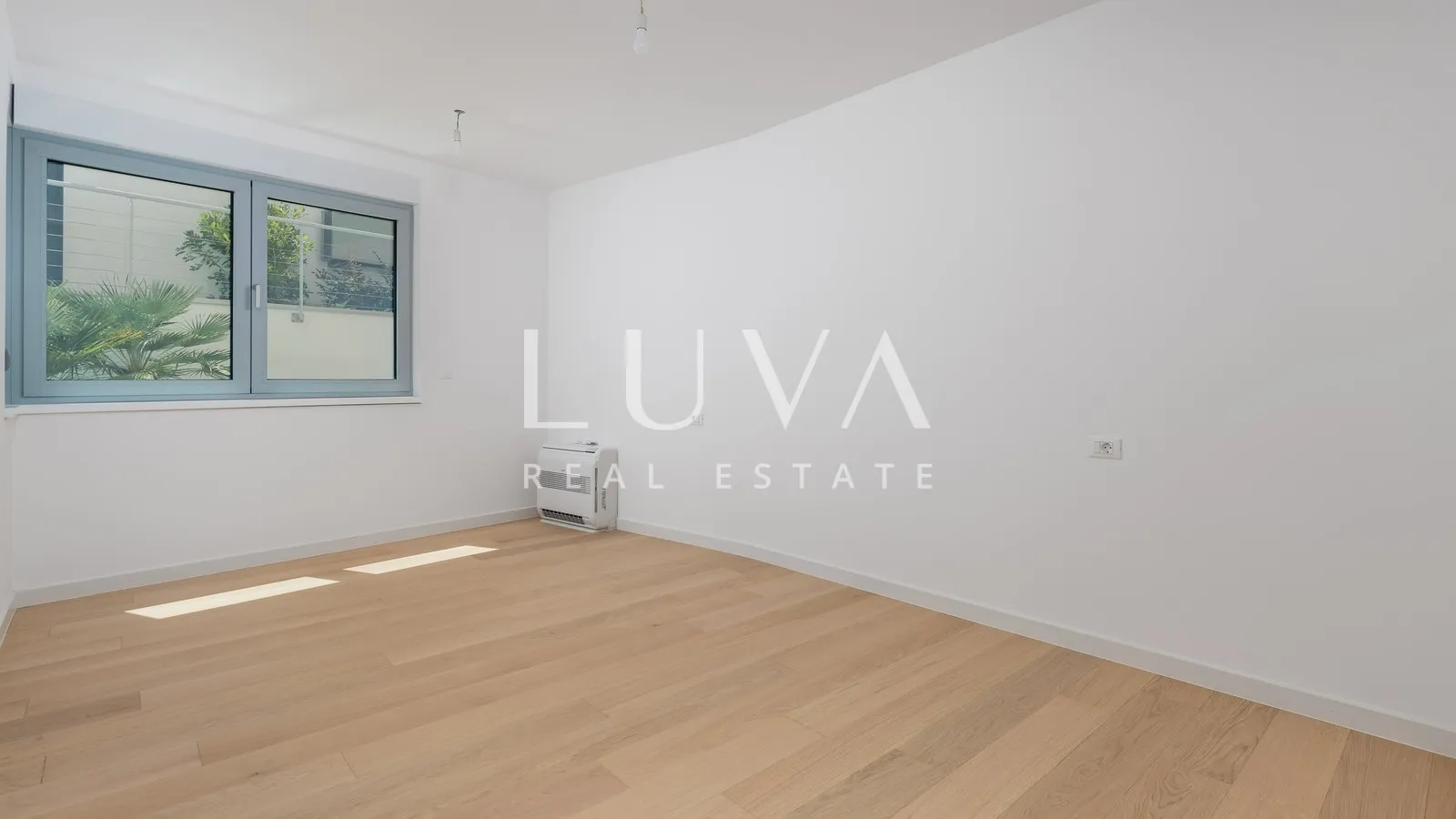 Opatija, luksuzna novogradnja s vrtom, stan NKP 134,33 m2
