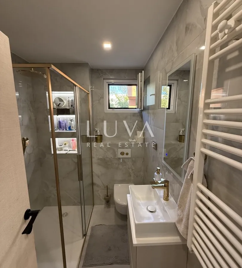 Zagreb, Blato, designer two-room apartment with garden, NKP 68 m²